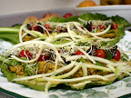 Green wraps. Spicy Red Russian mustard greens for the bed, topped with some miso, seed/veggie pate, tomatoes, green onions, marinated/dehydrated eggplant, alfalfa sprouts, and zucchini shreds.