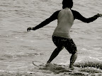 Aya in black & white showing good form on her wave approach