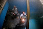 Scott and Mike in the seal tank at the Niigata Russian Village Haikyo