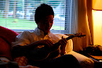 Shag strums on the Foote Family sofa