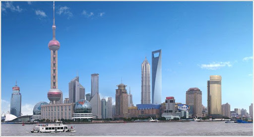 Pudong skyline with the future Shanghai World Financial Centerphot-shopped in. Next to the two towers will go another 90+ story building taller than Jin Mao. (not my photo) Pudong means 
