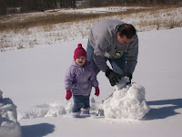 Spring &ndash; Paw Paw and Ruthie building a snowman