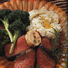 Pan-Seared Rib-Eye Steaks with Goat Cheese, Caper and Sun-Dried Tomato Butter