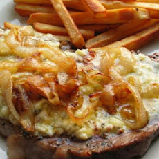 Pub Style Peppered Stilton Steaks With Charred Onions and Chips