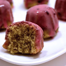 Green tea petite fours with blackberry icing
