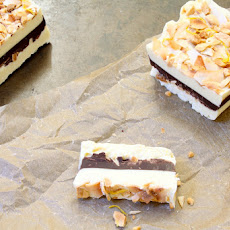 Salted White Chocolate + Toasted Cardamom Bar with Coconut + Limequat Zest