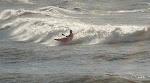 Keith Wikle Surf Kayaking lake Michigan tossed in the foam as the wave closes out. keithwikle.com