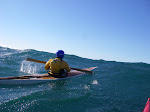 Doug Van Doren in his Valkyrie about to crest the swell on Lake Michigan. The bow of my Silhouette is just visible in this shot. http://keithwikle.com
