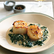 Seared Scallops on Spinach with Apple-Brandy Cream Sauce