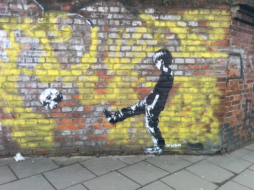 Boy Kicking Ball Mural