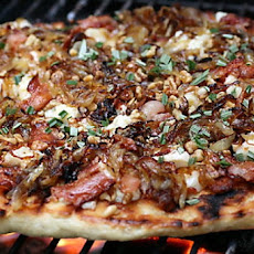 Caramelized Onion Pizza With Gorgonzola, Bacon and Arugula