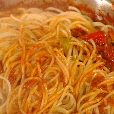 Spaghetti with a Hole and Artichokes: Bucatini al Ragu con Carciofi