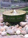 Mühlstein Brunnen