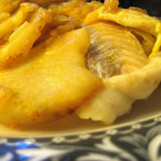 Baked Fish With Potatoes, Onions, Saffron and Paprika