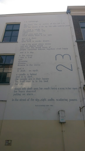Wall poem E.E. Cummings (1894-1962)