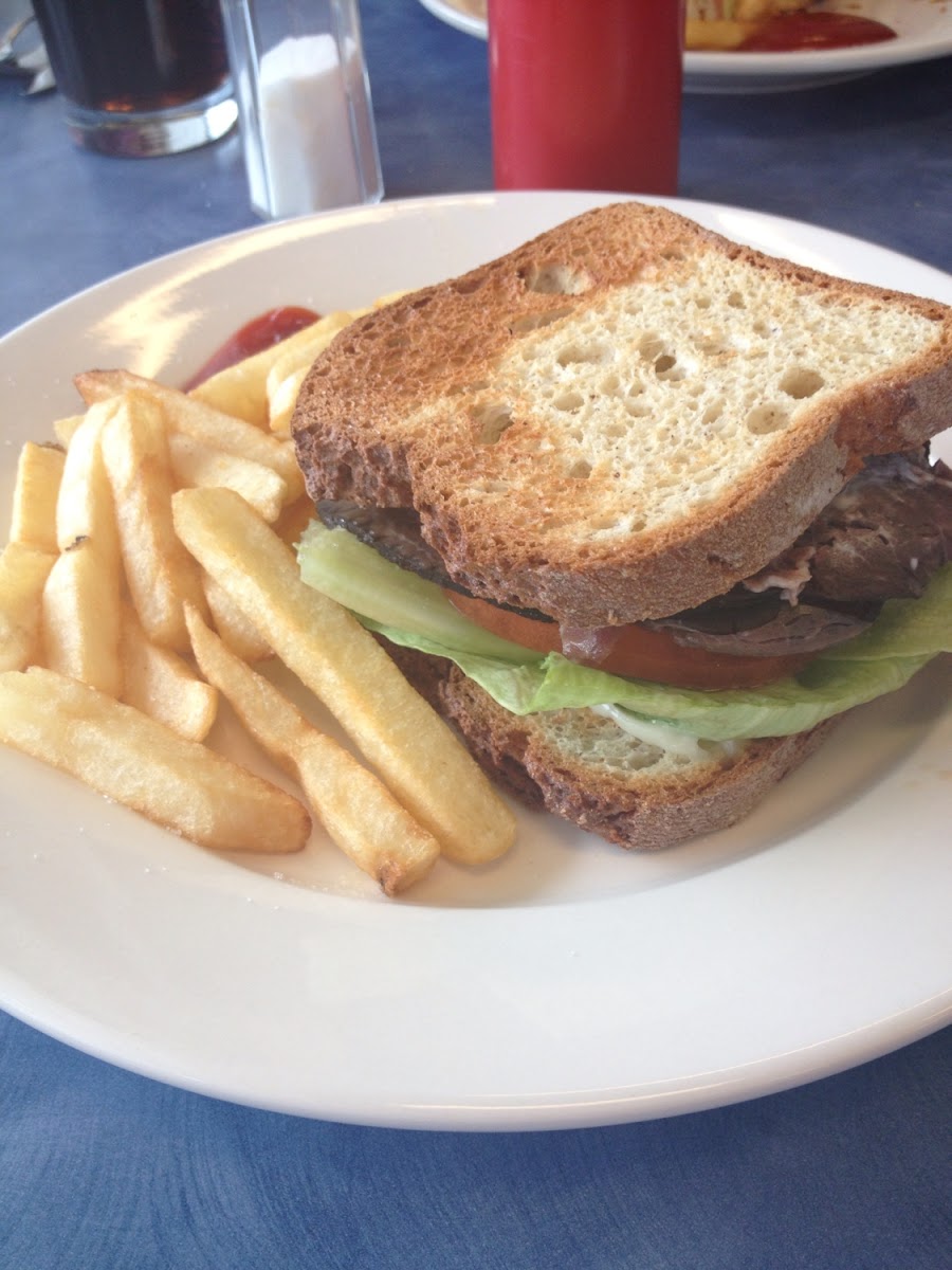 Gluten Free Roastbeeg Sandwich with French Fries that are cooked separately than other fried items.