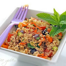 Quinoa Salad with Yellow Tomatoes, Kalamata Olives, Basil + Mint