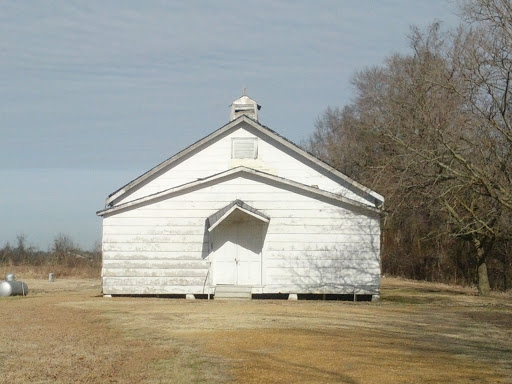 Rundown Church with Attached Cemetery
