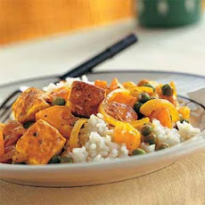 Tofu with Red Curry Paste, Peas, and Yellow Tomatoes