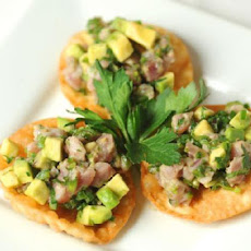 Tuna and Avocado Tartare with California Caviar on Sesame Wonton Crisps