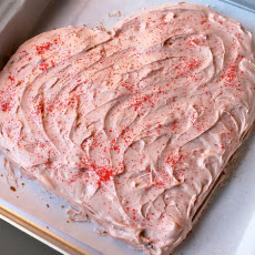 Champagne raspberry heart shaped cake with cream cheese brown sugar frosting