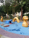 Dragon and Hippo in the Playground
