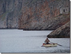 Man Rowing to His Nets