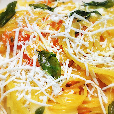 Capellini with Yellow Tomato Sauce and Fried Basil
