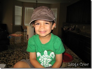 Cute in Mommy's hat (1)