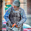 Old Man Winter 3 by Bill Tiepelman - Professional People Business People ( minnesota, winter, cold, sculpting, ice, carving, saint paul winter carnival, chainsaw, man )