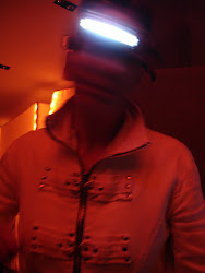 <p>
	Jamie with wireless head camera and kinectic LED sculpture by Diana Burgoyne; from 'Grace - A New Media Duet'.</p>
