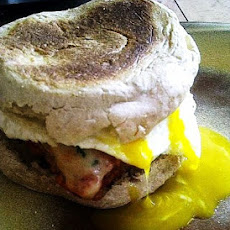 Veal Parmesan Morning Sandwich with a Fried Egg on Whole Wheat English Muffin