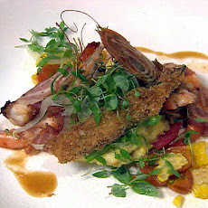 Pancetta Wrapped Bayou La Batre Shrimp with Rikards Mill Yellow Corn Grits and Grilled Heirloom Tomatoes