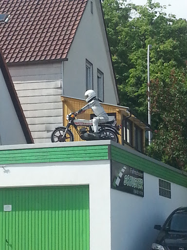 Motorcycle On A Roof
