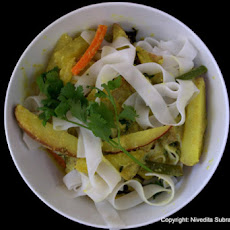 Avial stew with Banh pho noodles