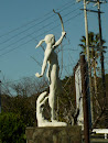 Statue of Woman Holding Bow