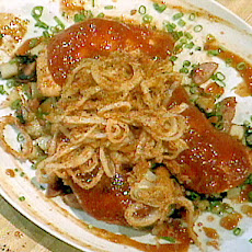 BBQ Salmon over Andouille Potato Hash with Crispy Fried Onions