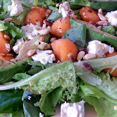 Avocado, Feta, Honeydew on Greens Topped With Pine Nuts