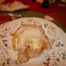 Layered Almond-Cream Cheese Bread Pudding With Amaretto Cream Sa