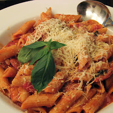 Pasta in Sausage, Cremini, and Tomato Cream Sauce