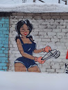 Граффити «Девушка с инструментом »