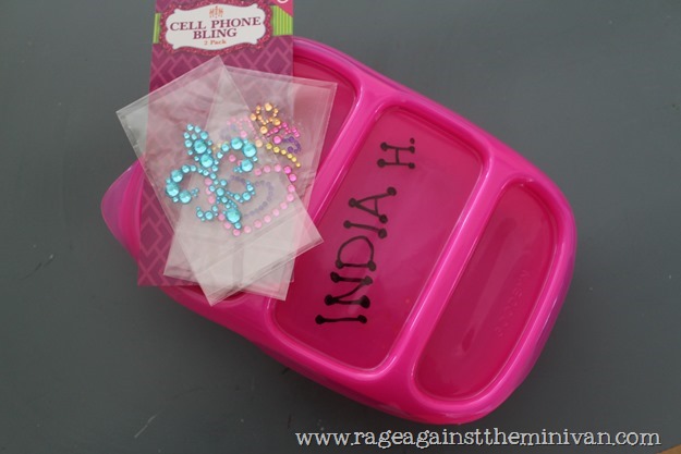 A $9 bento and a $1 cell-phone bling pack = a cheap way to personalize a kid's lunchbox and reduce waste.