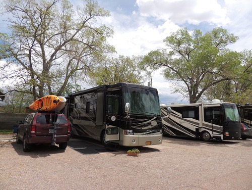 Our site at Trailer Ranch RV Resort. There is a picnic table and grassy area behind the Jeep