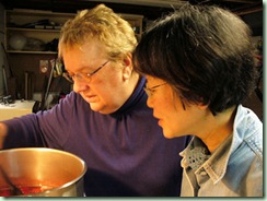 Sandra and Masami stirring pot