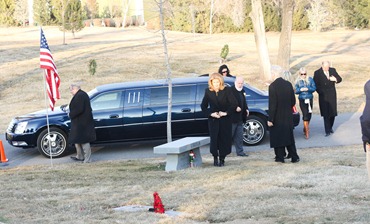 family heading to graveside (1 of 1)
