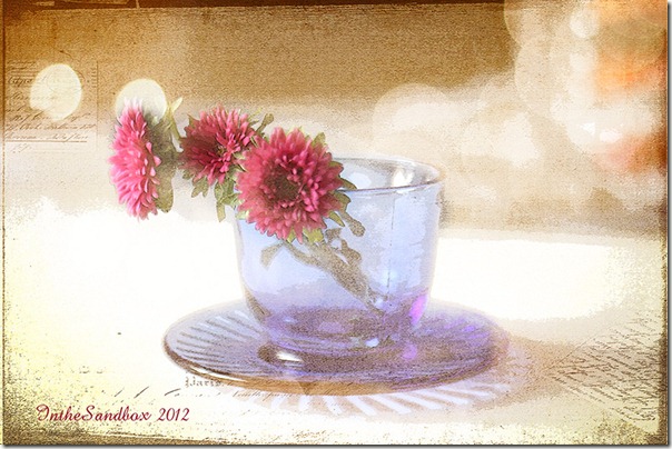 pink-mums-in-blue-cup-with-textures