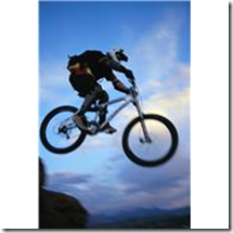 Mountain Biker Jumping Cliff ca. 2002