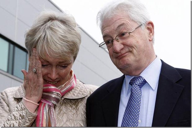 Retired businessman Christopher Tappin, with his wife Elaine, gives a statement outside Heathrow police station