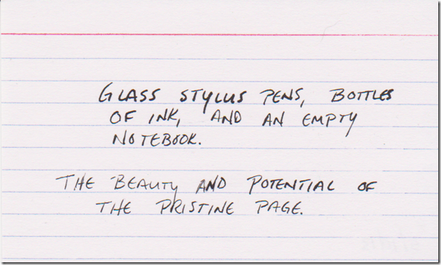 Glass stylus pens, bottles of ink, and an empty notebook. The beauty and potential of the pristine page.