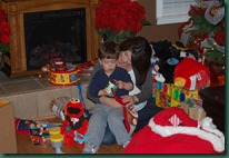 mom and jake opening gifts